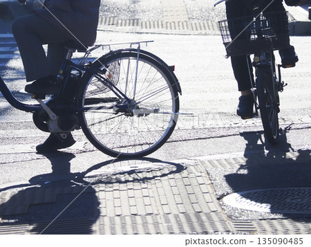 Image of a person riding a bicycle Image of a person riding a bicycle 135090485