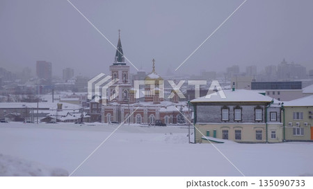28 December 2025, Barnaul, Russia. Church of the Icon of the Mother of God of the Sign, showcasing exterior architecture, historic landmark, and urban cityscape. 135090733