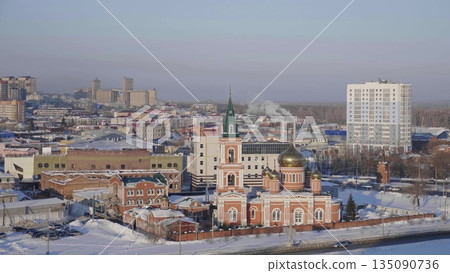 28 December 2025, Barnaul, Russia. Church of the Icon of the Mother of God of the Sign, showcasing exterior architecture, historic landmark, and urban cityscape. 135090736