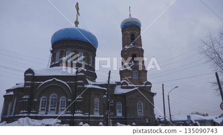 January 2026, Barnaul, Russia. Pokrovsky Cathedral on Nikitin Street, showcasing exterior architecture, historic landmark, and cityscape of the Altai region. 135090743