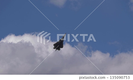 25 July 2021, Russia, Zhukovsky. Su-57 fighter jet performs aerobatic maneuvers at MAKS 2021 air show, showcasing advanced military aviation, precision flying, and aircraft performance. 135090753