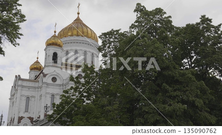 Russia, Moscow. View of the Cathedral of Christ the Savior, showing the exterior architecture, surroundings, and cityscape of the capital. Russia, Moscow. View of the Cathedral of Christ the Savior, showing the exterior architecture, surroundings, and cityscape of the capital. 135090762