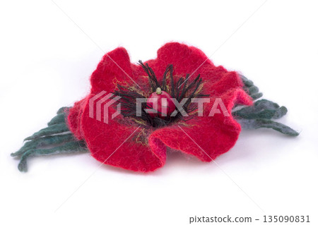 Brooch felted wool on a white background Brooch felted wool on a white background 135090831