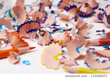Pencil shavings scattered on white, symbolizing art, creativity, and education 135090972
