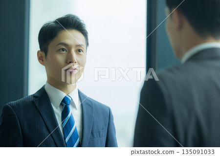 Businessman shaking hands Businessman shaking hands 135091033