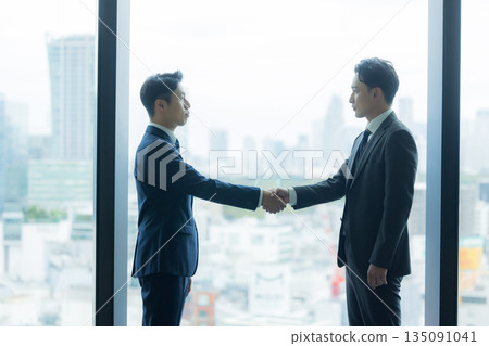 Businessman shaking hands Businessman shaking hands 135091041
