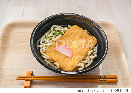 Delicious Kitsune Udon noodles warmed in the microwave Delicious Kitsune Udon noodles warmed in the microwave 135091209