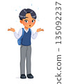 Confused Asian school boy shrugging shoulders. Cartoon vector illustration. 135092237