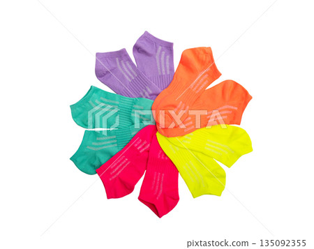 multicolored socks on a white isolated background. multicolored socks on a white isolated background. 135092355