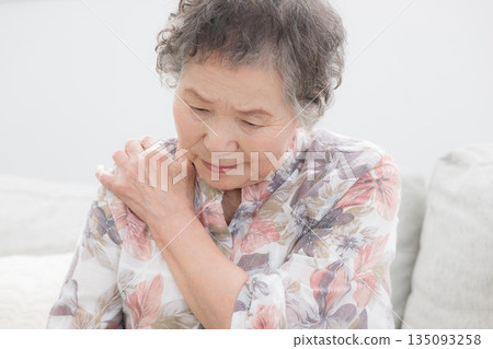 Image of a senior elderly woman with shoulder pain and poor physical condition Image of a senior elderly woman with shoulder pain and poor physical condition 135093258
