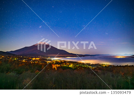 Mount Fuji over Lake Yamanaka in winter Starry sky Mount Fuji over Lake Yamanaka in winter Starry sky 135093479