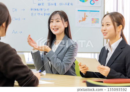 A woman making a meeting A woman making a meeting 135093592