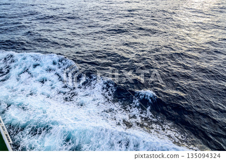 Ocean waves seen from a boat 135094324