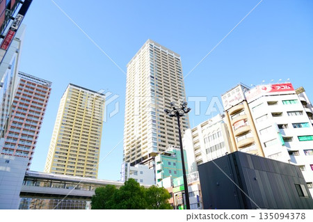 High-rise apartment building in front of Nippori Station 135094378