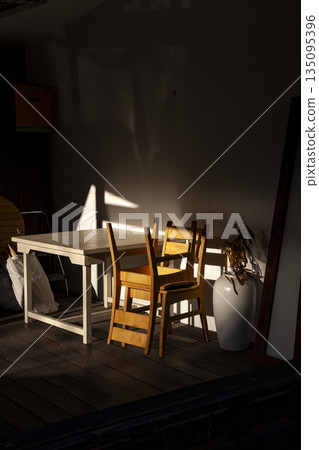 A desk and chair in a corner bathed in the sunlight, Bunkyo Ward A desk and chair in a corner bathed in the sunlight, Bunkyo Ward 135095396