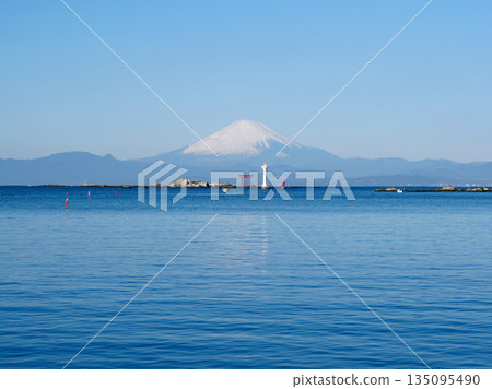 Mount Fuji and the Najima torii gate as seen from Manase Coast in Hayama Mount Fuji and the Najima torii gate as seen from Manase Coast in Hayama 135095490