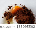 Baked goods ingredients (egg yolks and cocoa powder) 135095502