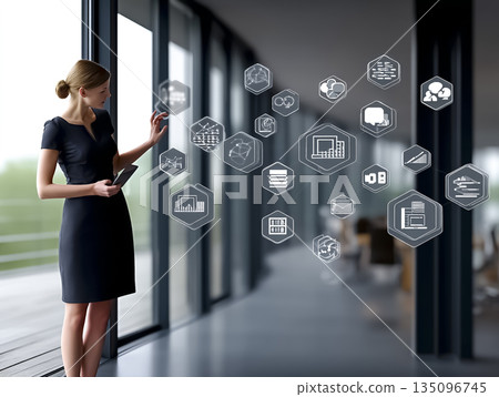 Businesswoman working with digital information | Image of futuristic office and technology 135096745