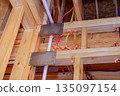 Construction work electrical wiring, plumbing installation in building project in residential area 135097154