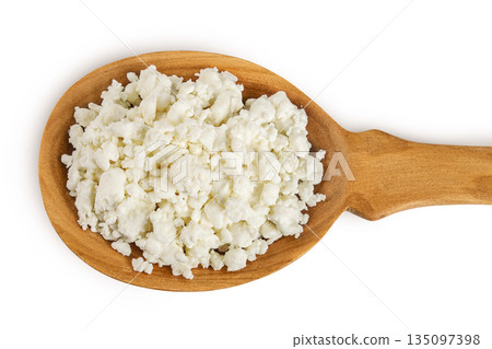Cottage Cheese, Curd in wooden spoon isolated on white background. Top view. Flat lay Cottage Cheese, Curd in wooden spoon isolated on white background. Top view. Flat lay 135097398