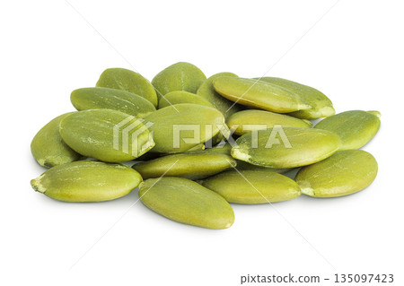 Peeled pumpkin seeds isolated on white background Peeled pumpkin seeds isolated on white background 135097423
