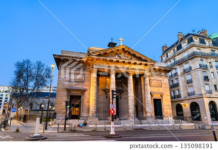 Church of Saint-Philippe-du-Roule stands in the 8th district of Paris, France. Neoclassical architecture features the stone facade with columns and pediment illuminated by sunset light 135098191