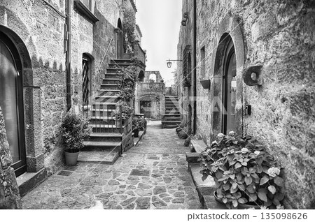 Picturesque Cobblestone Street in Ancient Civita di Bagnoregio, Italy Picturesque Cobblestone Street in Ancient Civita di Bagnoregio, Italy 135098626