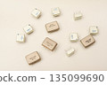 Old chips on a white background. Different electronic chips. Microcircuits in a metal case. 135099690