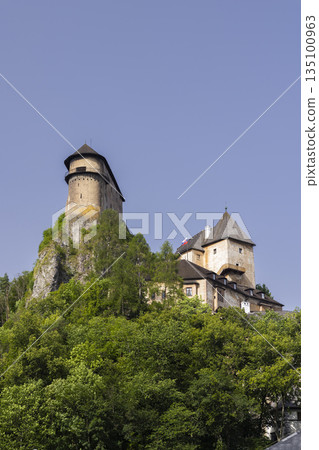 Orava Castle fortified stronghold rising above trees Orava Castle fortified stronghold rising above trees 135100963