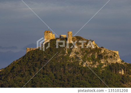 Staatz Castle Ruins on a hill at sunset 135101208