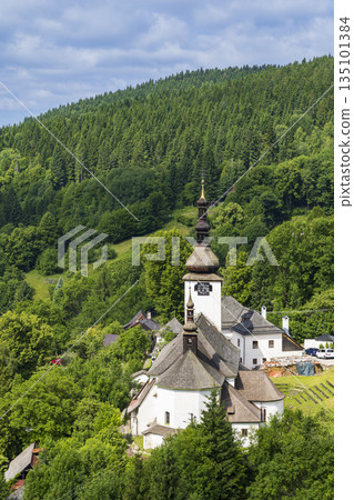 Historic mining village church in Spania Dolina Slovakia 135101384
