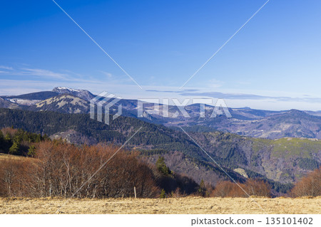 Ardeche mountains panorama under a clear blue sky in Auvergne Rhone Alpes Ardeche mountains panorama under a clear blue sky in Auvergne Rhone Alpes 135101402