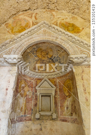 Ancient frescoes depicting saints in Tempietto sul Clitunno Ancient frescoes depicting saints in Tempietto sul Clitunno 135101419