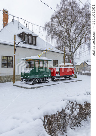 Lubochna forest railway train display in winter snow 135101501