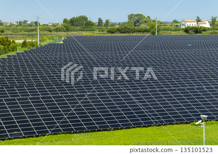 Solar panel array generating clean energy in Loreo 135101523