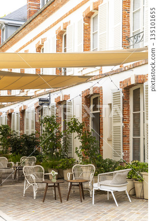 Epernay outdoor reception area with charming patio seating Epernay outdoor reception area with charming patio seating 135101655