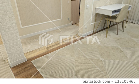 flooring transition between wood and carpet in modern apartment flooring transition between wood and carpet in modern apartment 135103463
