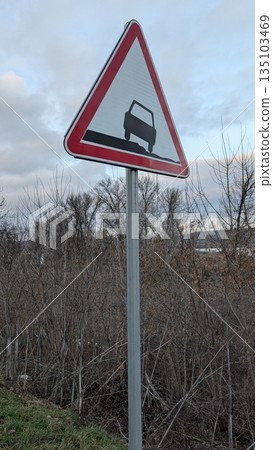 Image depicts safety indicator with aged surface and blurred background Image depicts safety indicator with aged surface and blurred background 135103469