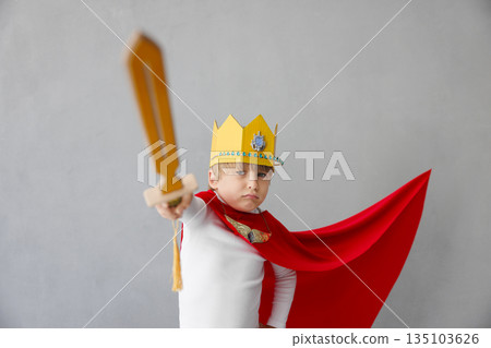 Child pretend to be knight. Kid having fun at home Child pretend to be knight. Kid having fun at home 135103626