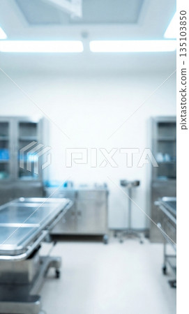 Abstract blur of sterile hospital operating room with stainless steel equipment. Medical interior background concept. Perfect for healthcare presentations and backdrops. 135103850