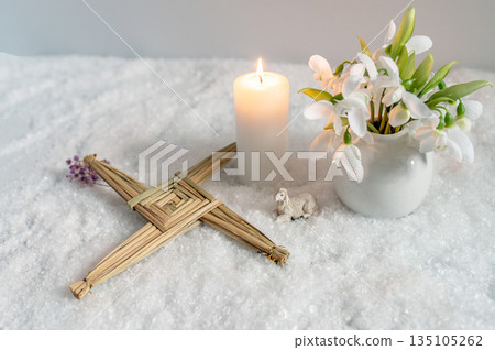 Wiccan altar for Imbolc sabbath, pagan holiday ritual. symbol of Imbolc holiday, spring equinox. Wiccan altar for Imbolc sabbath, pagan holiday ritual. symbol of Imbolc holiday, spring equinox. 135105262