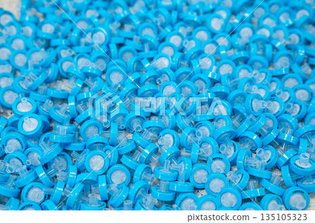 Syringe filters used for laboratory sample filtration and analytical preparation. 135105323