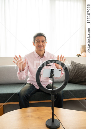 Senior man streaming video Senior man streaming video 135107066
