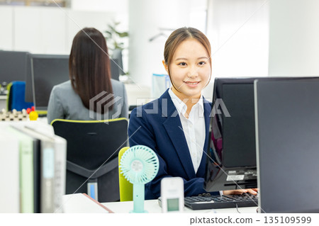 Woman working in the office Woman working in the office 135109599