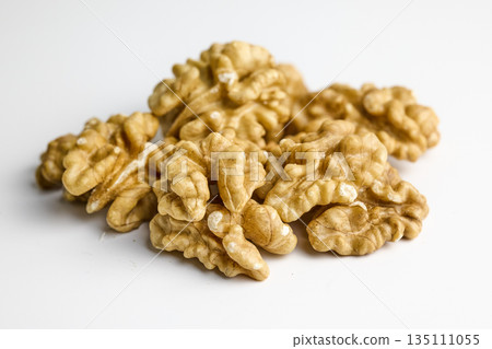 Group of Shelled Walnut Kernels on White Background. High quality photo Group of Shelled Walnut Kernels on White Background. High quality photo 135111055