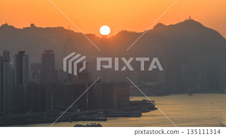 Jan 4 2026 Golden Sunset Over The Peak tower Hong Kong 135111314