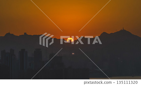 Jan 4 2026 Golden Sunset Over The Peak tower Hong Kong 135111320