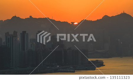 Jan 4 2026 Golden Sunset Over The Peak tower Hong Kong Jan 4 2026 Golden Sunset Over The Peak tower Hong Kong 135111323