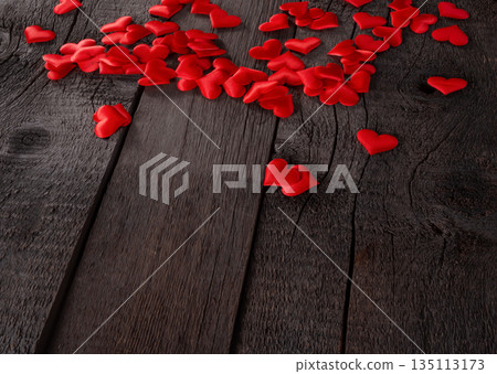 Red Hearts Scattered on Wooden Background Symbolizing Love and Passion. Valentines Day and Love Wallpaper Background. 135113173