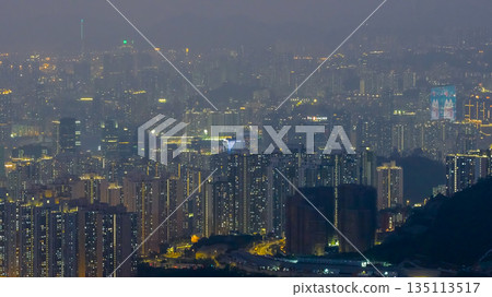 Dec 31 2025 Vibrant Kowloon skyline glowing under starry night sky Dec 31 2025 Vibrant Kowloon skyline glowing under starry night sky 135113517